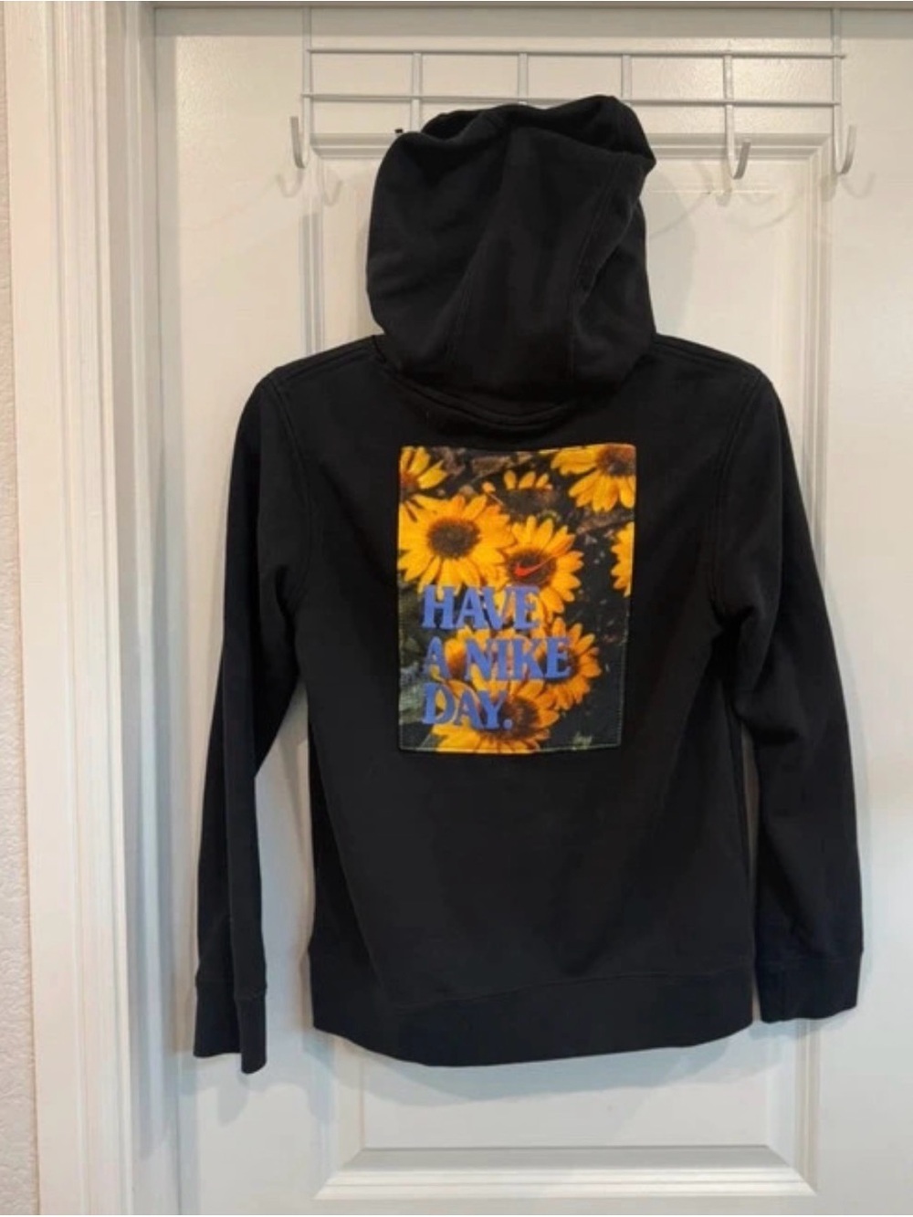 Kids unisex Nike Black Zip-Up Hoodie with Yellow Sunflower Graphic